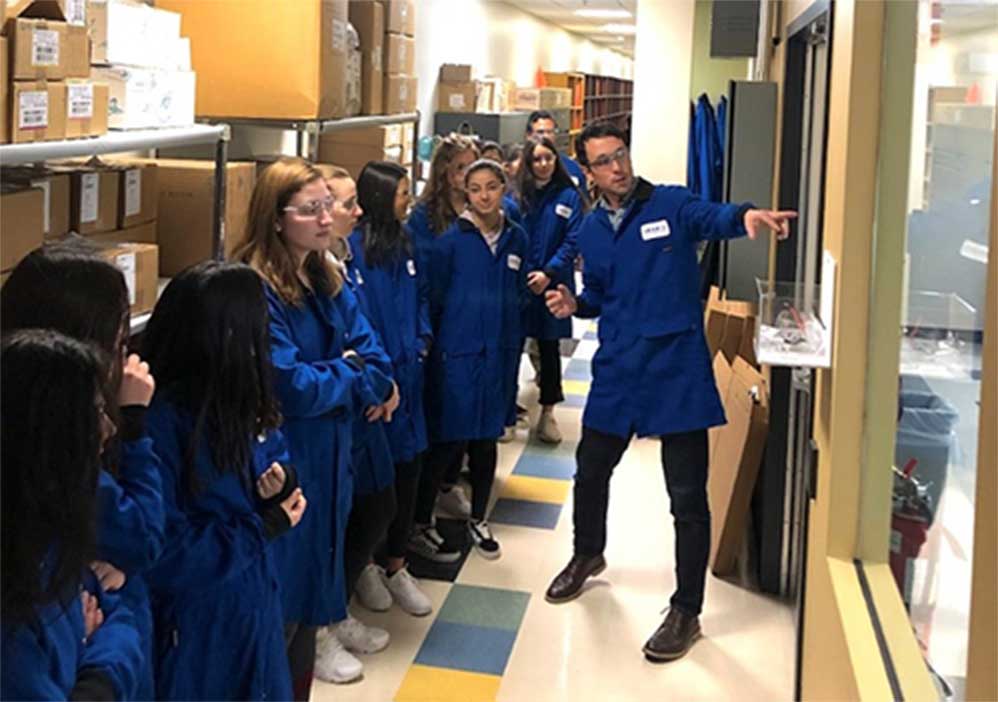 image of employee leading a STEM education event