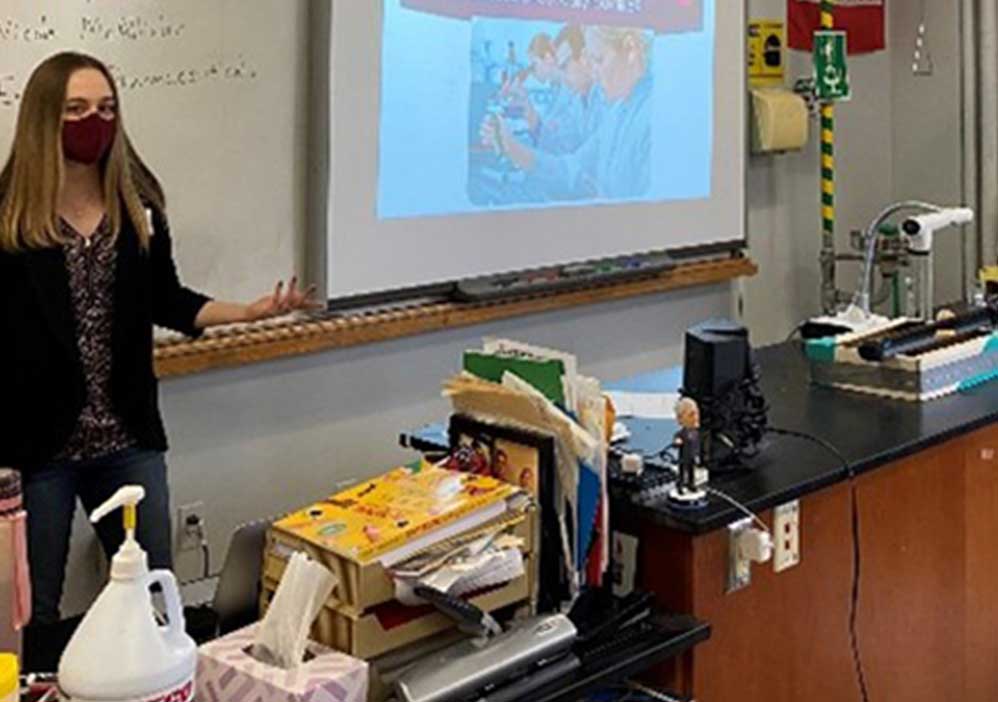 image of an employee at a school education event